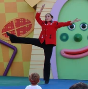 The jacket being worn by a female Six Flags host.