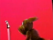 Puppet Wags chasing the microphone