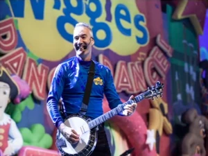 Anthony playing his six-string banjo