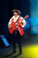 Captain Feathersword playing Maton bass guitar