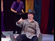 Paul Paddick as the dog catcher in "Wiggledance!"