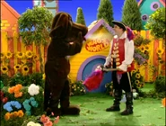 Wags blowing Captain Feathersword down