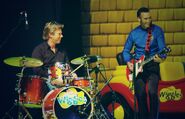 Anthony playing Murray's red Maton electric guitar in "Pop Go The Wiggles!" concert