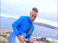 Anthony playing his blue Maton electric guitar in Clovelly