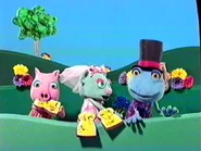 Frog, Mrs. Mouse and Pig eating fried mosquito on bread and butter after the wedding