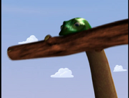 A CGI diplodocus lifting a log