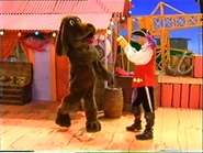 Captain Feathersword Shaking Flea Powder on Wags