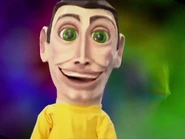 Puppet Greg close to the screen