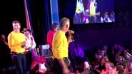 Simon as a yellow Wiggle fill in at second The Original Wiggles Reunion Show For Bush Fire Relief