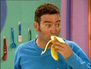 Anthony eating banana