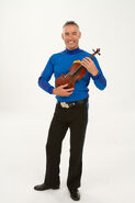 Anthony holding his favorite violin