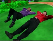 Murray and Jeff lying on grass