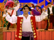 Captain Feathersword showing his strong muscles