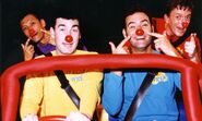 The Wiggles wearing red noses on "Red Nose Day" while in the Big Red Car