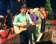 Anthony playing the Takamine EN10C guitar on Carols in the Domain