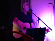 Greg singing at the Unwined bar