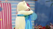 Fairy Clare and Teddy Bear hugging each other