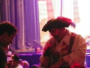 Captain Feathersword and a boy