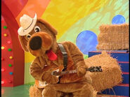 Wags playing Greg's yellow Maton electric guitar while wearing a cowboy hat in "Top of the Tots"