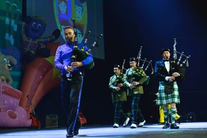 Anthony playing bagpipes