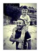 Antonio on Anthony's shoulders