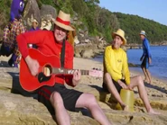 Greg playing bongo bucket and Murray playing Maton acoustic guitar