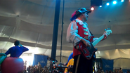 Captain Feathersword playing bass in a 2011 concert at the Cape Cod Melody Tent