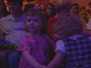 The little girls of the audience dancing in a circle