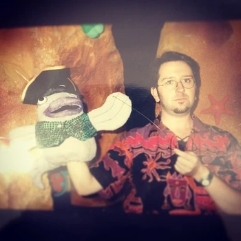 Haddon with the  puppet during production of a segment.