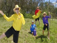 Greg singing on banana microphone