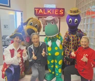 The full outfit being worn by the host of the Dorothy the Dinosaur Spectacular Show.