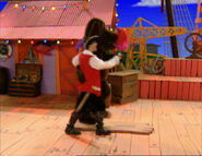 Wags and Captain Feathersword dancing the tango