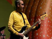 Greg playing Fender bass guitar in "The Celebration Tour"