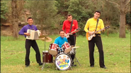 The Wiggles playing their instruments