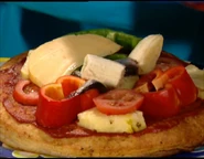 So Anthony puts cheese on the pizza