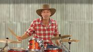 Anthony playing drums in The Wiggles Go Bananas!