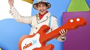 Sam playing the Nick Jr guitar