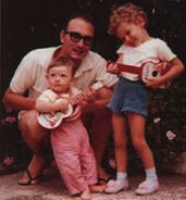 Baby Greg with his dad and his big sister, Belinda