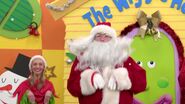 Santa (Callum Hendry-Hodsdon) in Christmas Carols and Kids Holiday Songs.