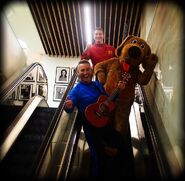 Simon, Wags and Anthony on escalator