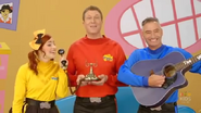 The Awake Wiggles call on Wiggly Telephone while singing.