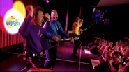 Anthony playing his blue Maton acoustic guitar in The Original Wiggles Reunion Show For Bush Fire Relief