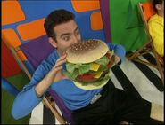 Anthony eating hamburger in "Jeff the Mechanic"