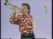 Phillip playing the trumpet