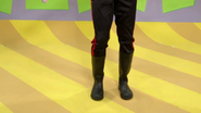 Simon's black rubber boots