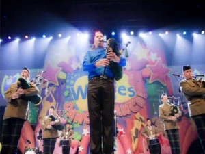 Anthony playing the bagpipes