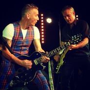 Anthony and John performing during the band's 2014 reunion.