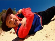 Benny rolling down the sandhills.