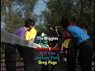 Officer Beaples pointing to The Wiggles