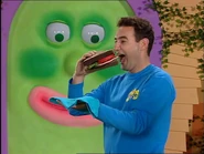 Anthony eating a sandwich